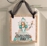 Hanging card with the fairy in teal over kraft with the censored sentiment.