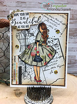 Addison Girl mixed-media card, the AngieGirl figure's skirt colored with patterned papers, 'Let's Party' sentiment on a layered background.