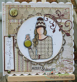 Layered card with the winter girl colored in browns, 'merry & bright.'