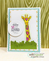 Card with the giraffe standing over a green city skyline, 'you make me feel loved all over.'