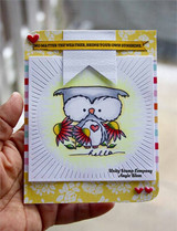 Yellow floral card with a pull-flag panel, the owls colored in soft greys and reds, and a small script word reading Hello.
