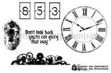 Stamp sheet: three number tiles reading 8, 5 and 3, a grungy keyhole plate, a large Roman numeral clock face, a border of gears and the sentiment 'Don't look back you're not going that way'.