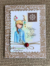 Kraft card with the antlered girl colored in blue on a stitched frame with 'Merry & Bright.'