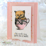 Kitten-in-a-teacup colored soft orange and pink on a white panel with 'life needs more sweet tea & smiles.'