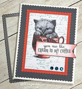 Gray kitten in a coral teacup on a scalloped panel with a 'you are the cream in my coffee' banner.
