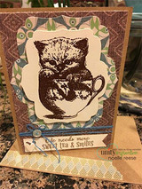 Sepia-toned kitten in a teacup layered on patterned papers with 'life needs more sweet tea & smiles.'