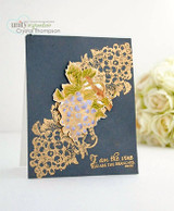 A navy card with the grape branch heat embossed in gold along the corner, with the sentiment 'I am the vine you are the branches' in gold.