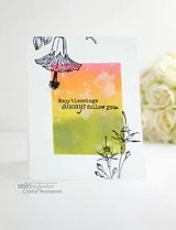 The bloom stamped over a sunset-ombre rectangle on a clean white card, with "May blessings always follow you."