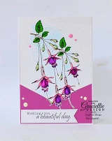 The drooping blooms colored purple and green over a magenta base, with "Wishing you a beautiful day."
