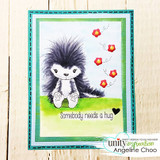 Card of the porcupine colored soft purple with trailing red flowers on green, 'Somebody needs a hug.'