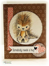 Warm brown card of the porcupine in a circle over a hearts print, 'Somebody needs a hug.'