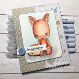 Watercolor baby fox on a soft blue and grey card with a button, shown with markers, sentiment 'Congratulations'