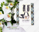Card with the skunk over plaid paper beside flowers, 'that really stinks'