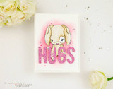 Soft pink card of the puppy with 'HUGS.'