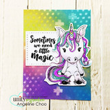 Bright card with the rainbow-maned unicorn on a colorful ombre background, stamped 'Sometimes we need a little magic.'