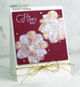 Deep red card with white-and-blush magnolias and a gold twine bow, 'Happy day.'