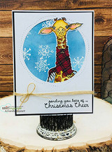 Card with the giraffe in a red plaid scarf on a blue snowflake circle and 'sending you lots of Christmas cheer.'