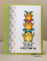 Card with a stack of yellow and blue owls over a scalloped lace border and the thank-you sentiment.