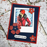 Navy-and-red card with the glam lady and paper flowers, 'Damn girl, you suck.'