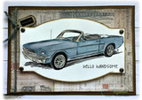 Card with a blue convertible on a metal-plate frame and "hello handsome"