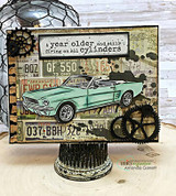 Card with a teal convertible on mixed-media papers with gears and the "all cylinders" sentiment