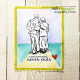 An older couple walking arm in arm stamped in red rubber and colored on a handmade card reading "Grow old with me."