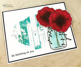 Kraft card with red poppies in a jar over distressed prints and 'I'm thinking of you.'