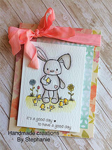 Card with the outlined bunny and chicks, stamped 'it's a good day to have a good day.'