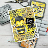 Handmade card featuring the cheery Cuddlebug bumblebee, on orange floral paper with a honeycomb die, stamped with 'Miss you a whole a-mount'.