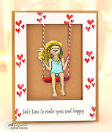 Kraft card with the girl on her swing inside a frame of tiny red hearts, 'take time to make your soul happy' beneath.