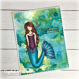 Teal and green watercolor card: the mermaid in deep teal with a small “you are loved” tag.