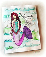 Card with hand-drawn scalloped waves: the red-haired mermaid with a purple tail beside the presence-of-wonder sentiment.