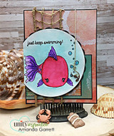 Card with a pink fish in a bubble circle and 'just keep swimming!'