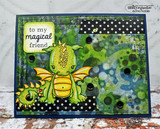 Card with the green mama dragon and baby on a splattered navy-and-green art background, 'to my magical friend.'