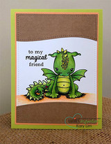 Green-bordered card with the dragons on a kraft hill, 'to my magical friend.'