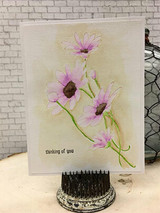 Soft vellum card with pink cosmos flowers, stamped 'thinking of you.'