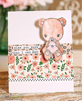 Pink floral card with a black dotted border, the teddy bear coloured in blush tones holding a heart, sentiment 'miss you more than I can bear'.
