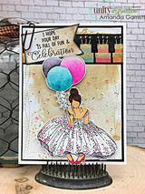 Card with the girl in a purple gown and balloons and "I hope your day is full of fun & celebration"