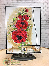 Red blooms colored over kraft watercolor wash on white card with sentiment tag