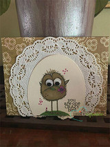 Card with a brown crazy bird on a doily oval, 'you are one CRAZY bird.'