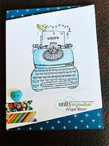 Navy card with the typewriter colored aqua, 'adore you'