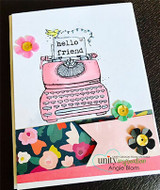 Card with the pink typewriter over a floral border, 'hello friend'