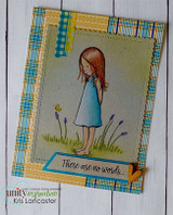 Plaid-layered card of the girl in a blue dress on grass with 'There are no words...'