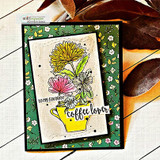 Yellow and pink blooms in a yellow teacup on a green floral card, stamped 'to my favorite coffee lover'.