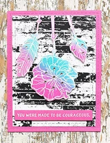 Pink and blue poppies on a black distressed-wood card, reading 'You were made to be courageous.'