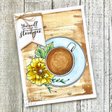 The coffee cup with yellow flowers on a warm wood-tone card, reading 'You will get through this, & it will make you stronger.'