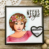 Close-up colored Angie Girl in a flower crown and pink top beside a 'tomorrow needs you' sample sentiment.