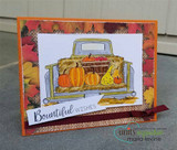 Card with the truck over warm fall-leaf patterned paper, 'Bountiful wishes.'