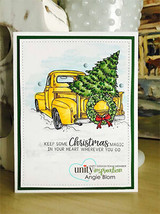 Yellow truck with tree and wreath colored on a green-framed card with the Christmas magic sentiment.