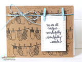 Kraft card with rows of stamped mittens, 'we are all unique... wonderfully beautifully made'